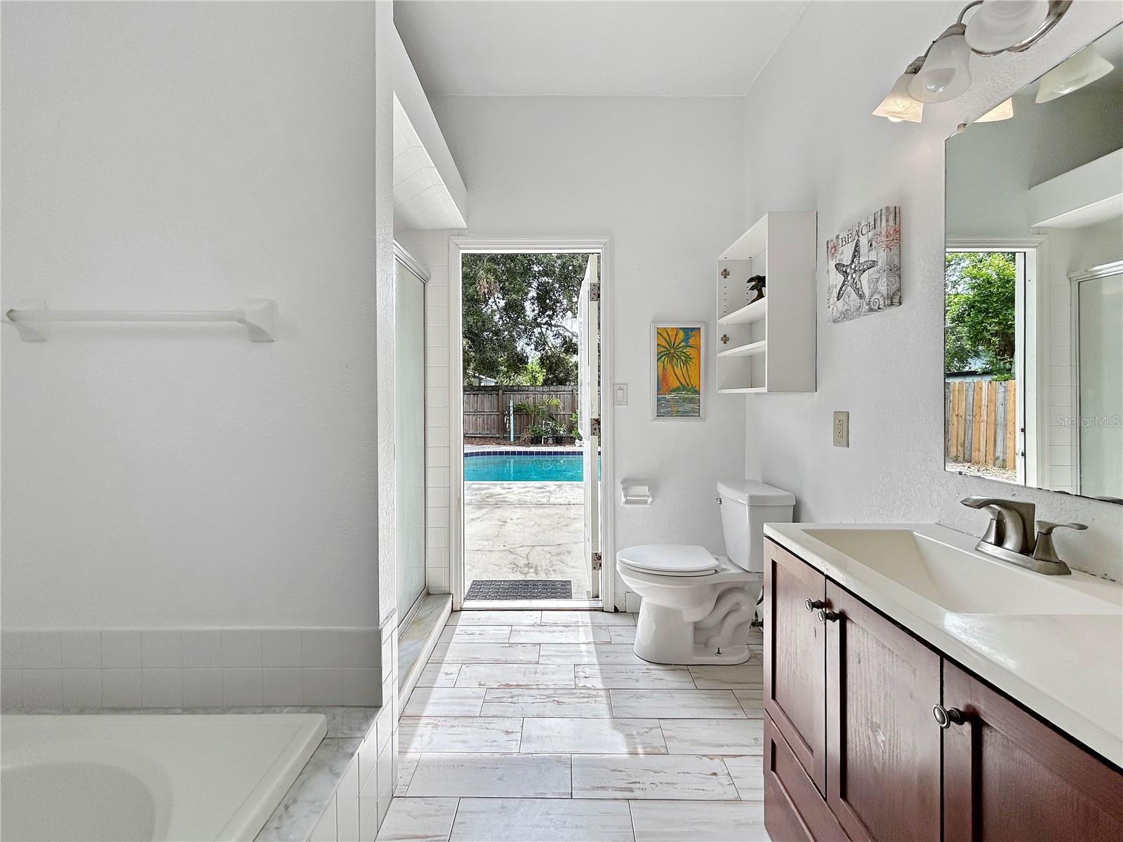 Primary Bath leading to the Pool Area