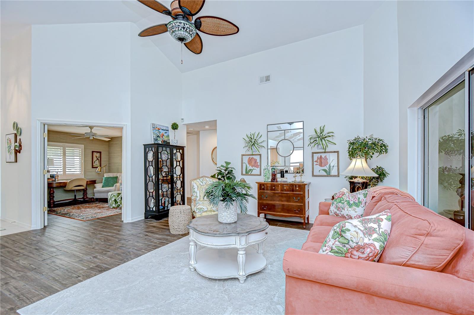 LIVING AREA LOOKING INTO DEN/BDRM3