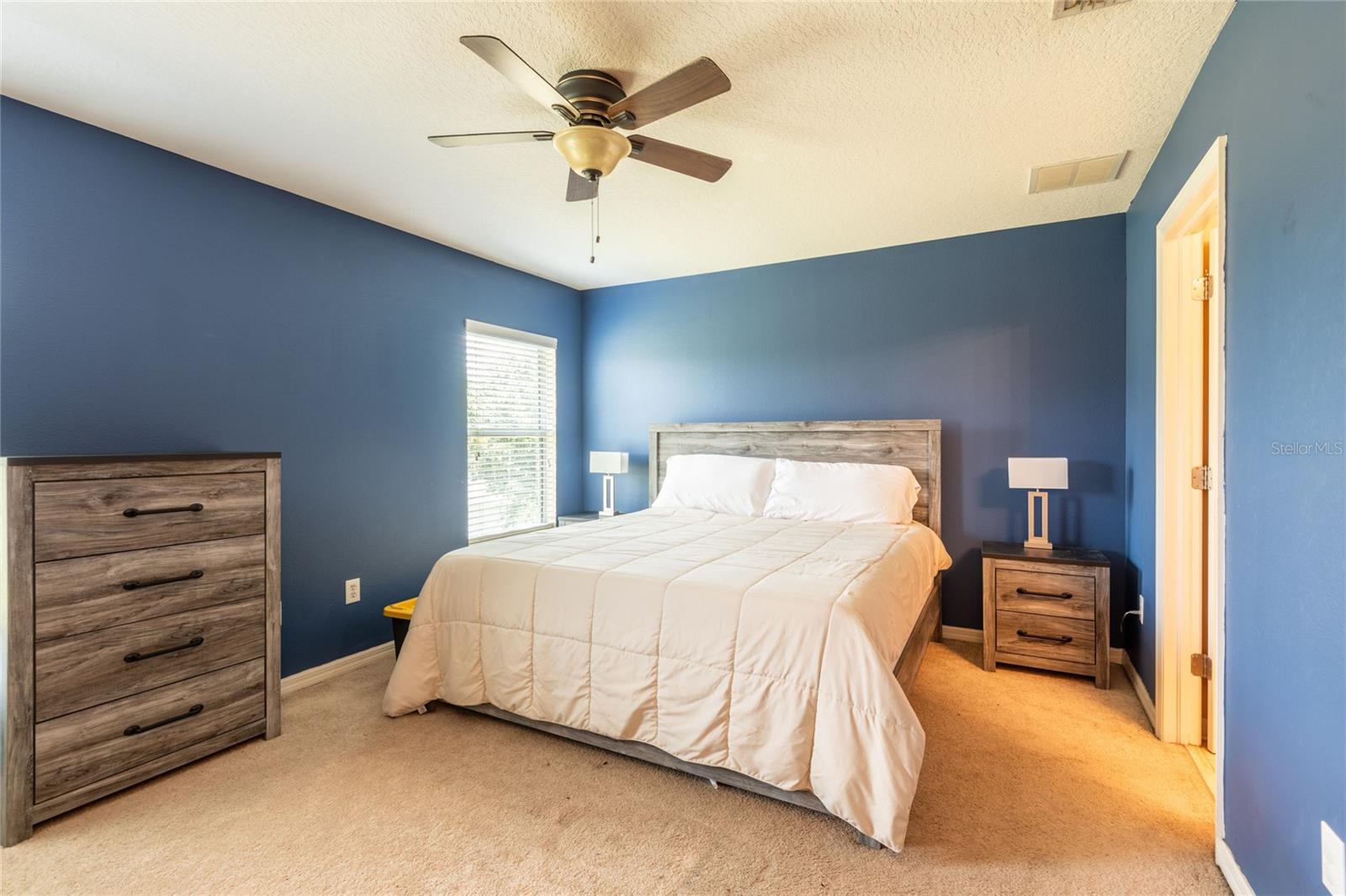 Spacious primary bedroom.