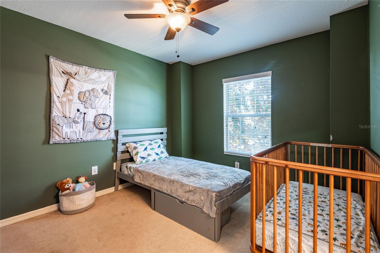 Large primary bath with a tub/shower combo, linen closet and walk-in closet.