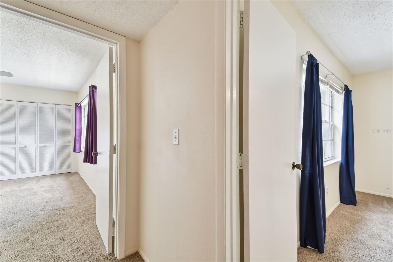 View at top of stairs. Primary bdrm to the left.