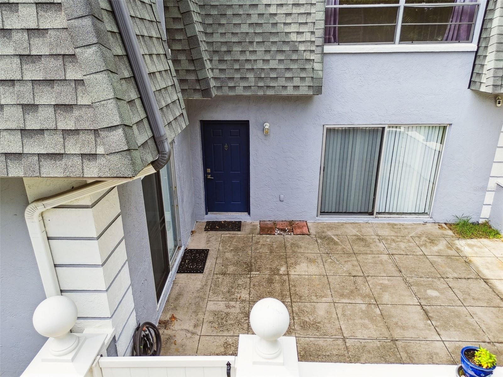 View of entrance and large patio