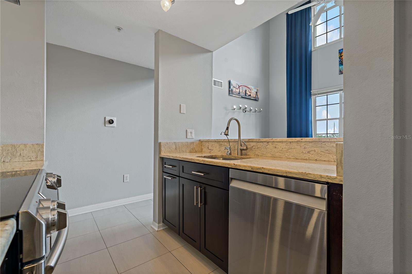 Open Kitchen Area with Access to Dining and Living Rooms