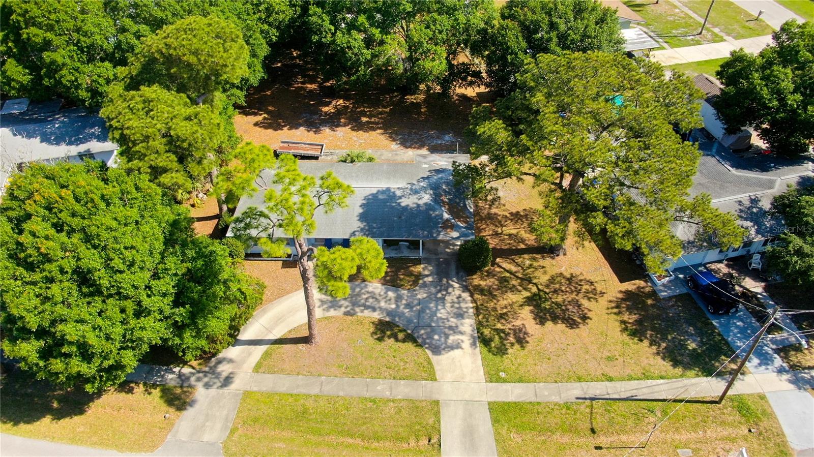 Aerial view with Circular Driveway and Large Back Yard