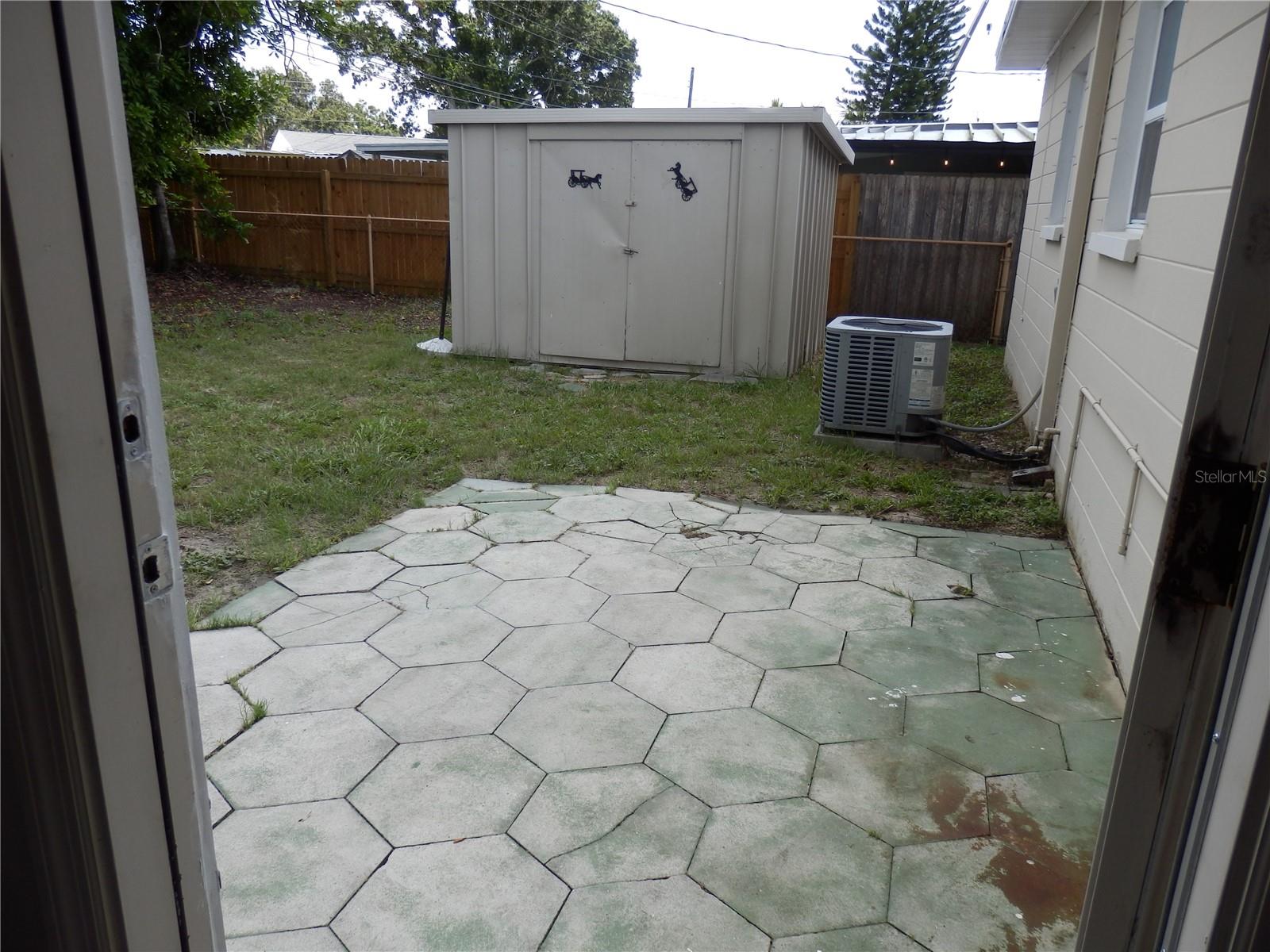 Going from Family Room to Outside Patio and Shed
