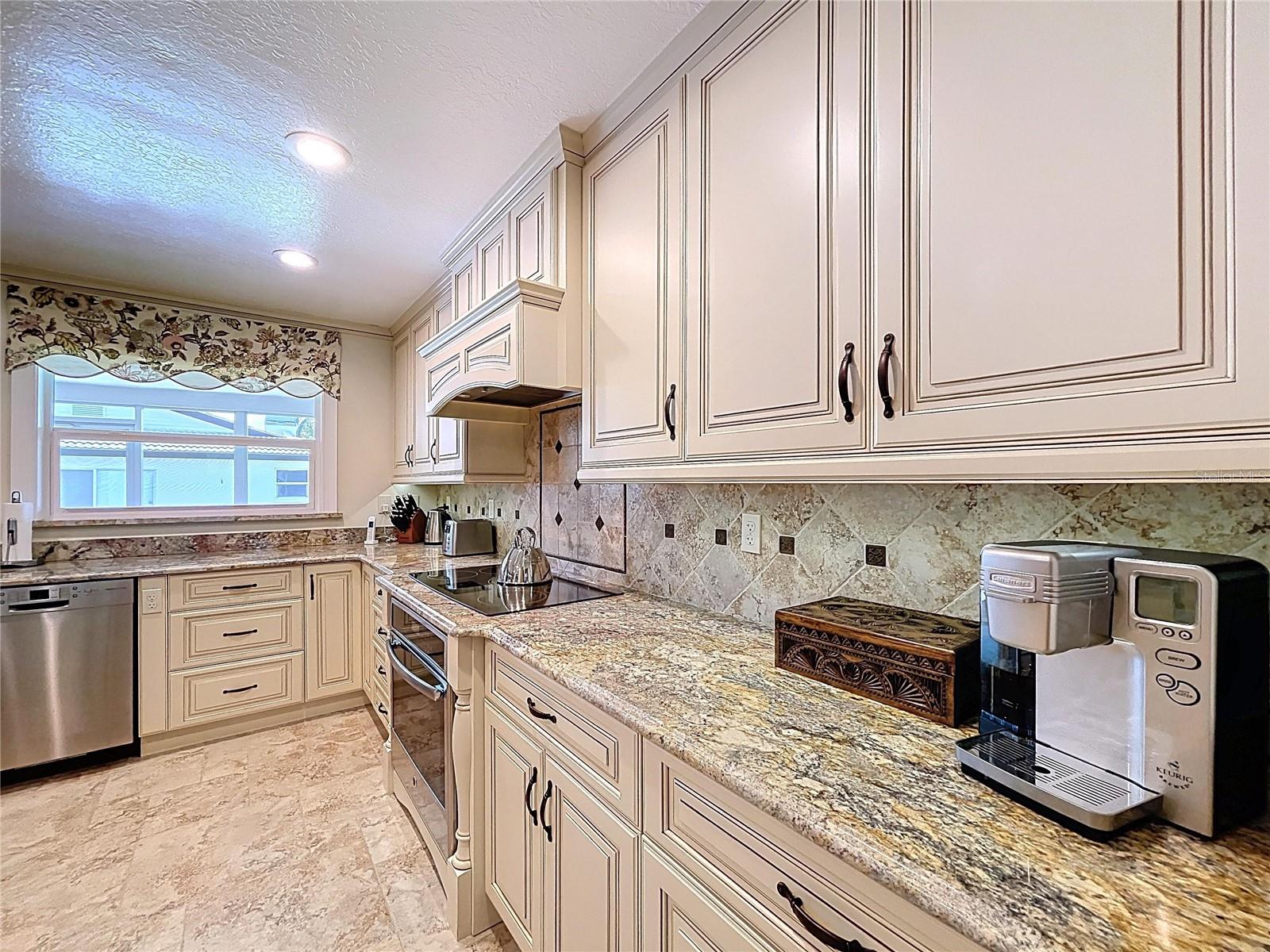 Cook top, coffee bar area...you name it and this kitchen has it.