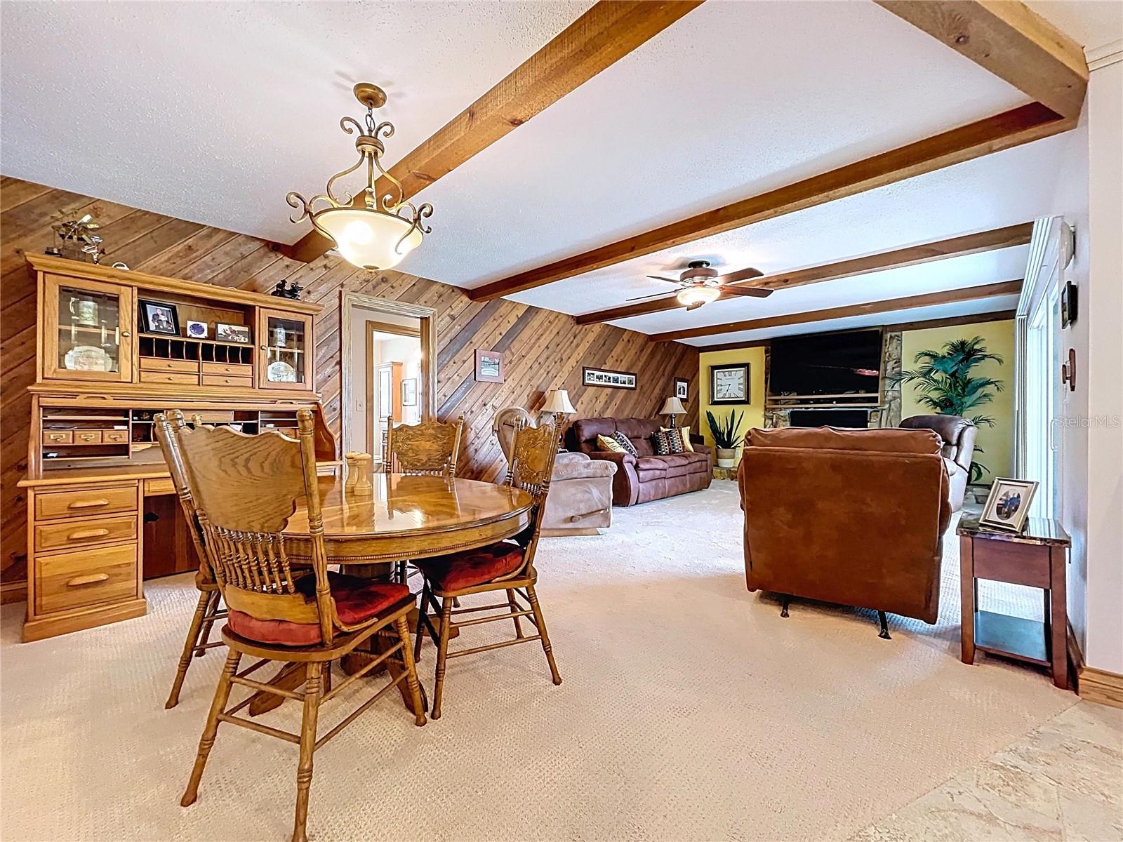 With a few touches this Family room/Dining room combo will pop!