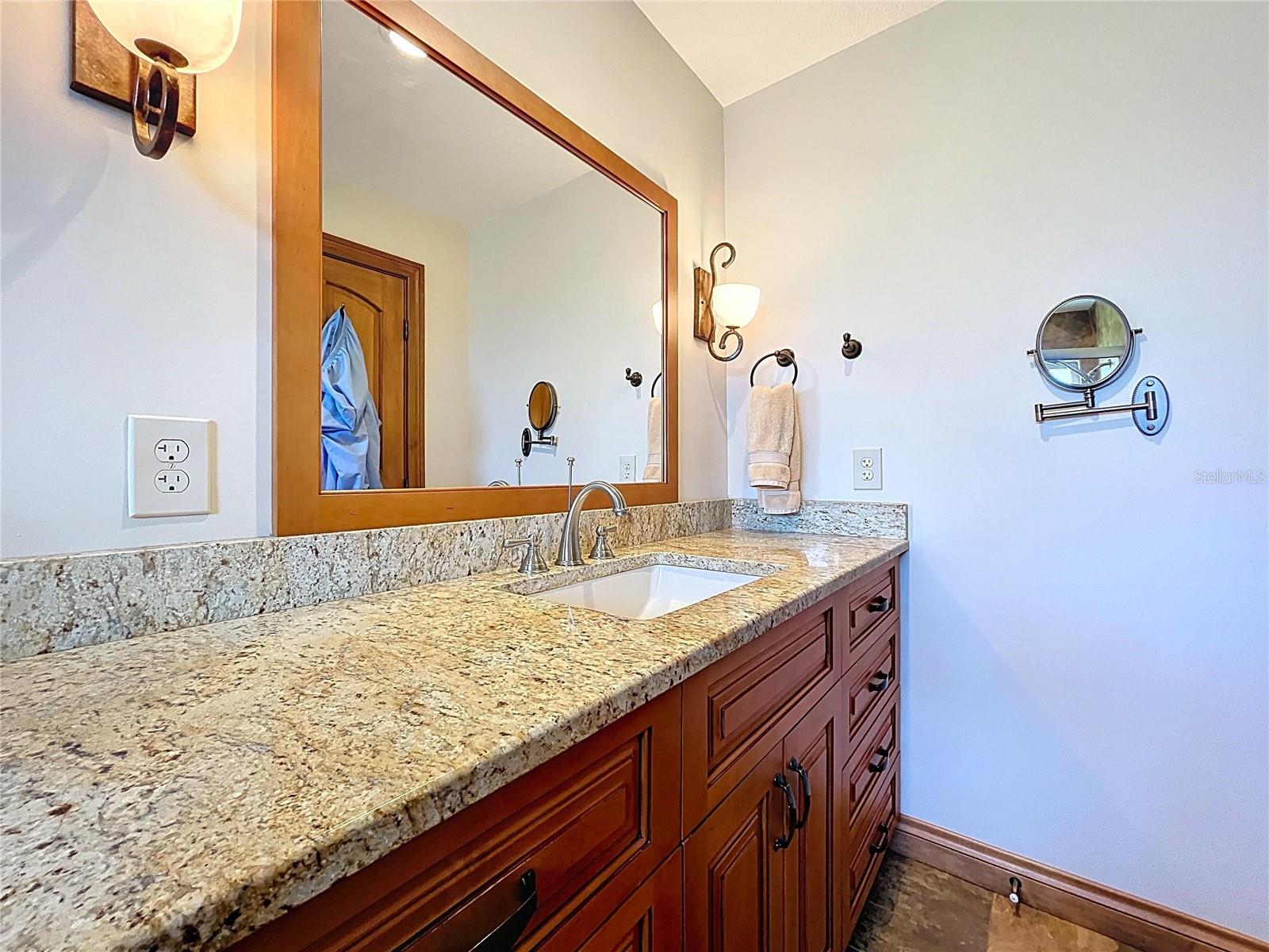 The en-suite bathroom is updated with a walk-in shower.