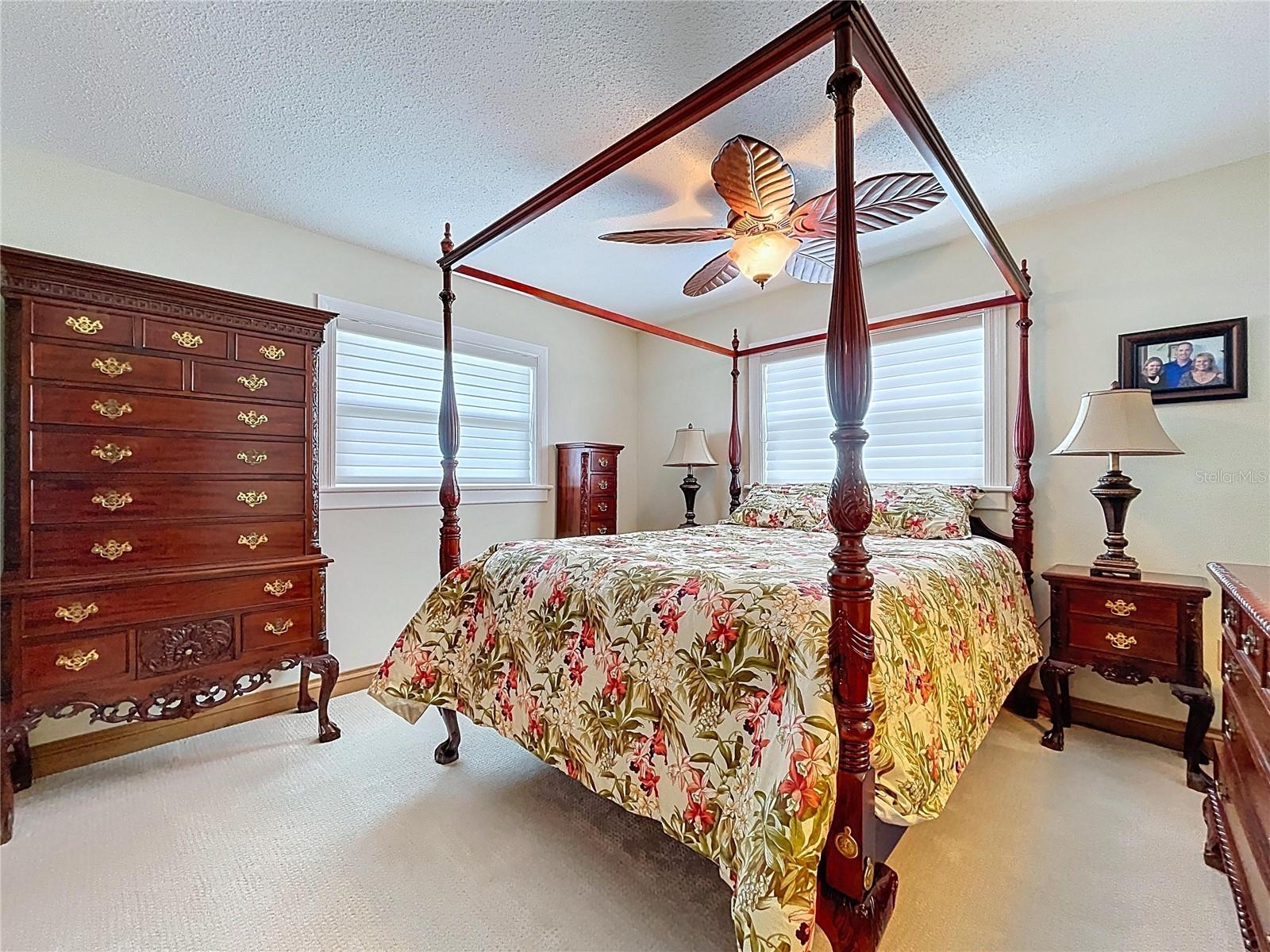 Bedroom 2. The guest bedrooms offer plenty or room for kiddos or company and the split floorplan offers privacy for both.