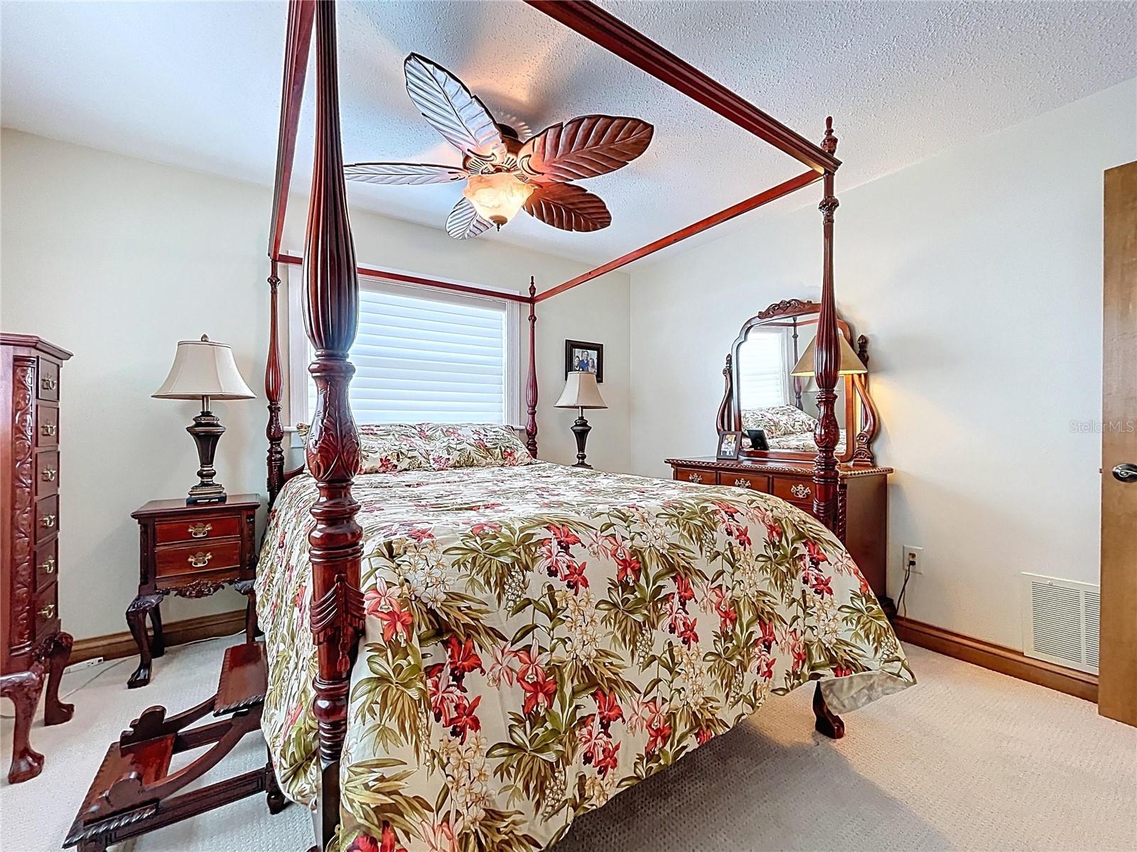 Bedroom 2. The guest bedrooms offer plenty or room for kiddos or company and the split floorplan offers privacy for both.