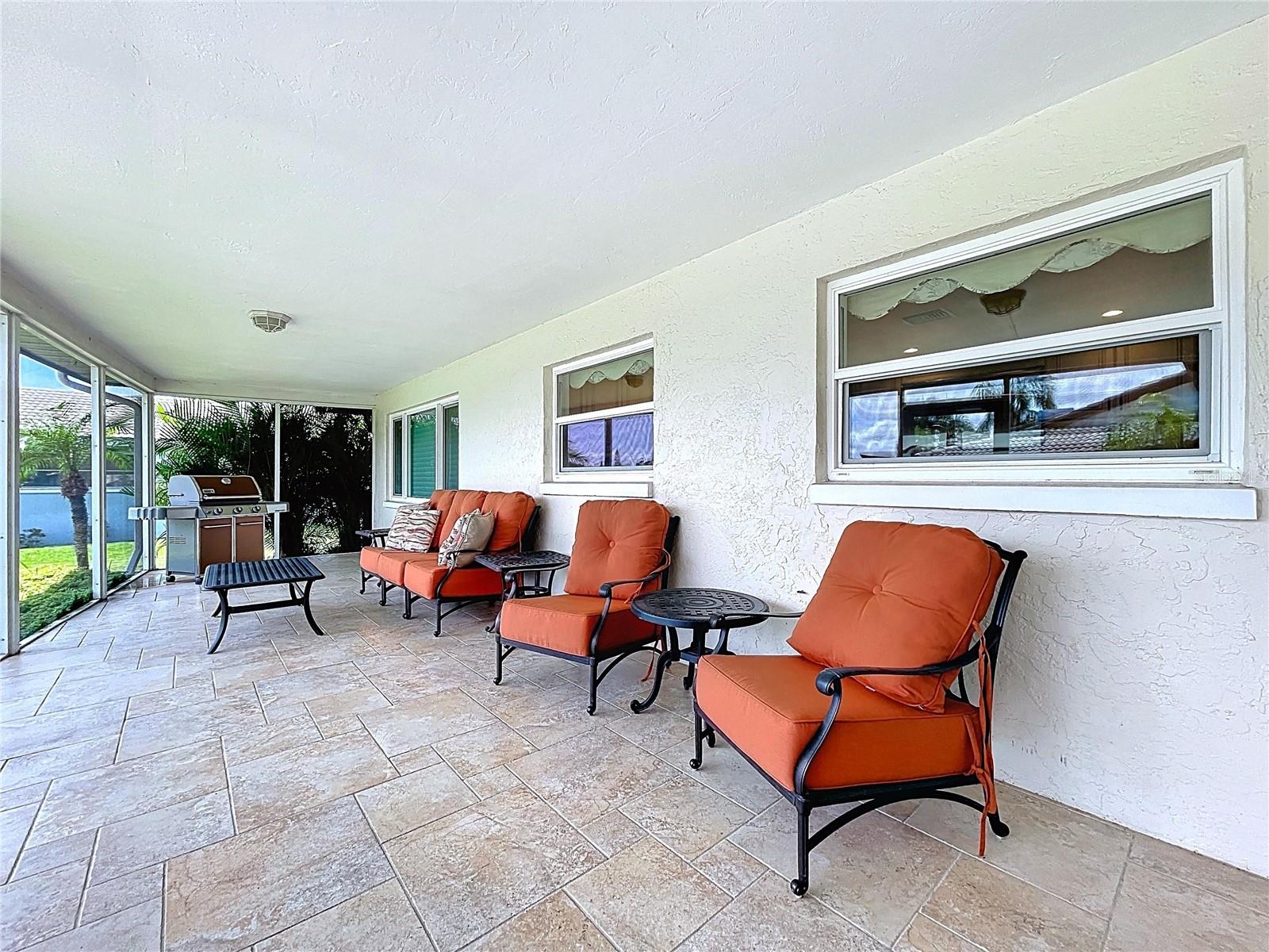 The screened in patio overs over 30' of outdoor space and views scenic of the lake.