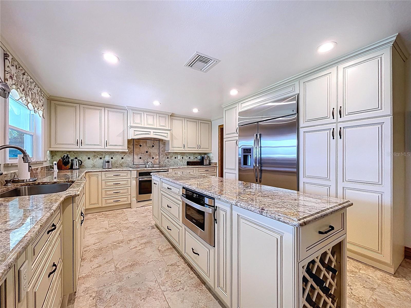 Exquisite custom kitchen, built to please any cook or baker.