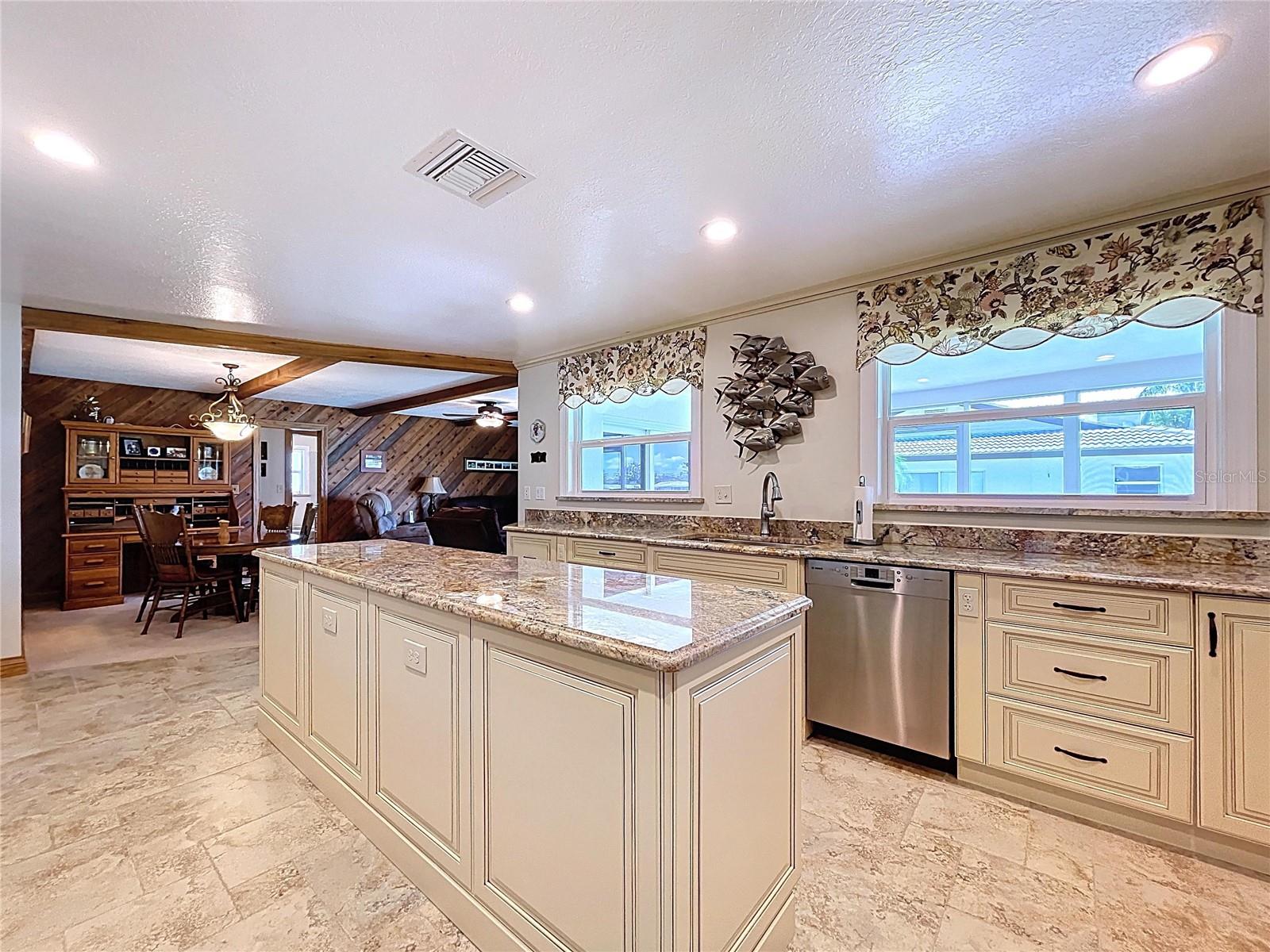 The kitchen measures 18'x13', it's HUGE!