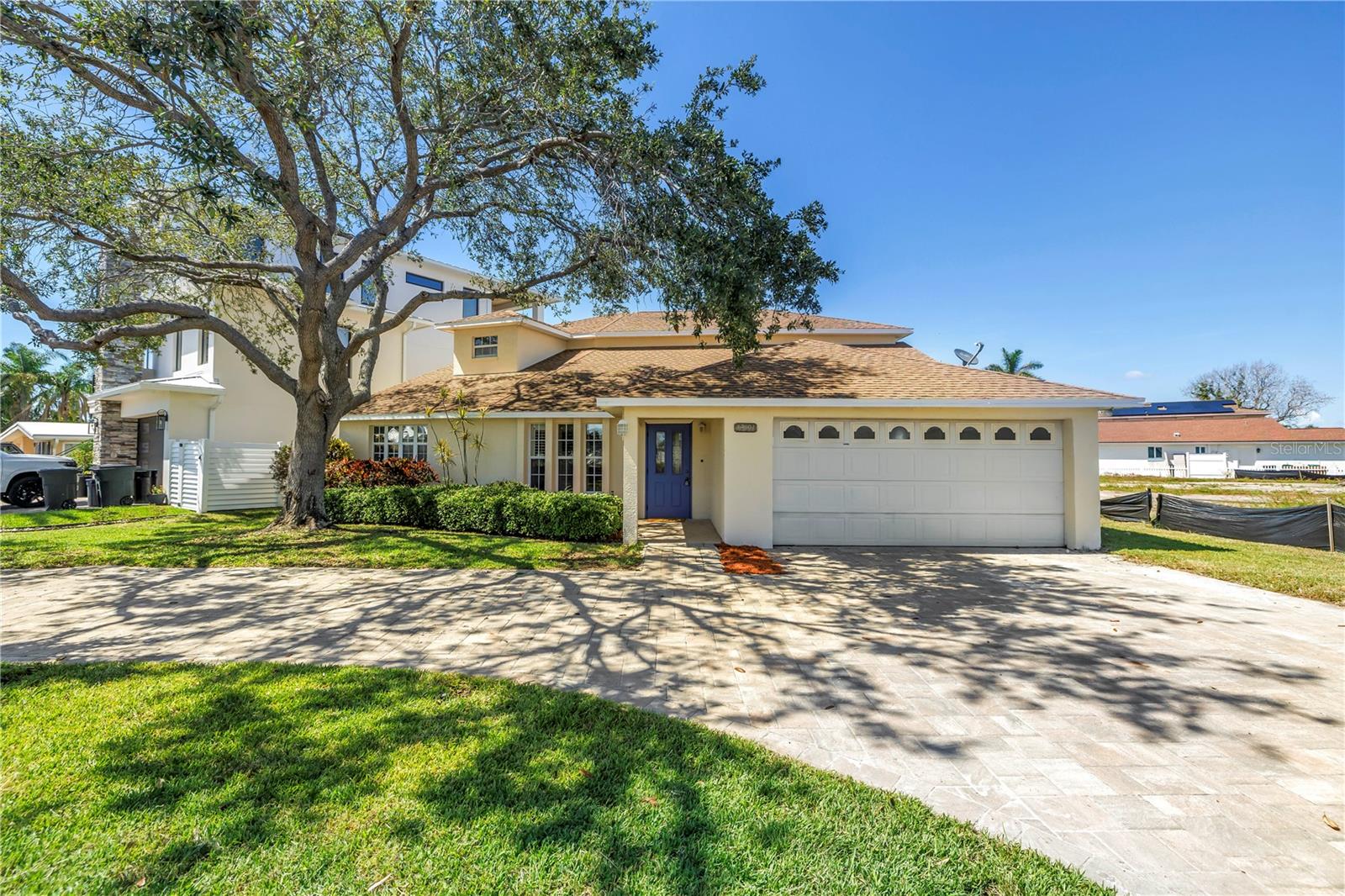 Circular driveway greets you.