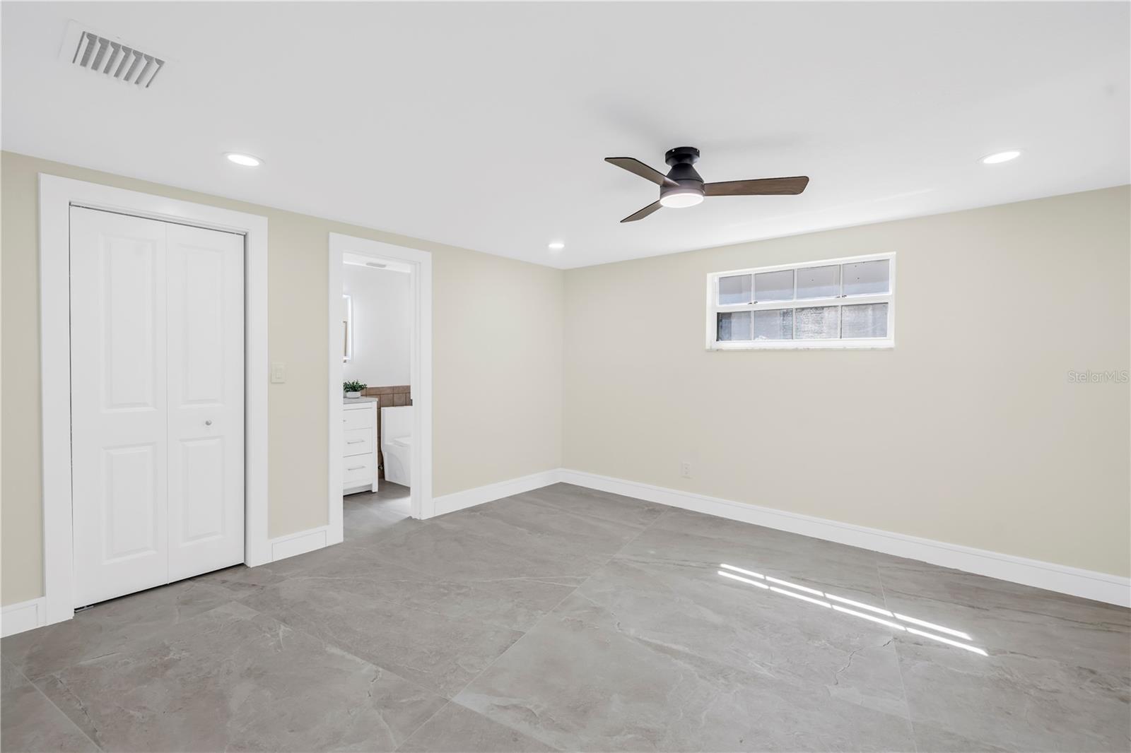 Guest bedroom #1 offers an en-suite and walk in closet.