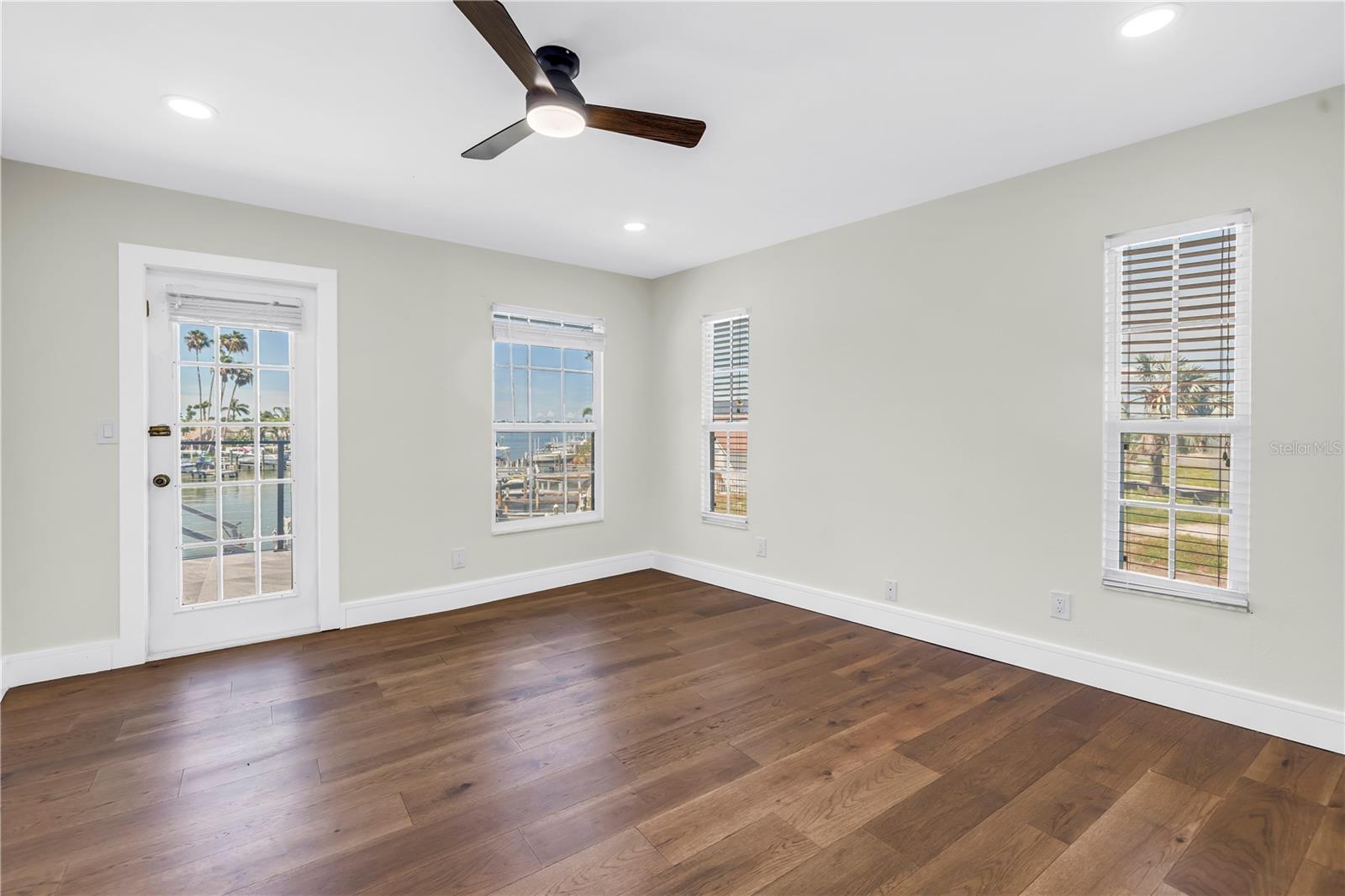 Upper guest bedroom #3 offers an en-suite and balcony access.