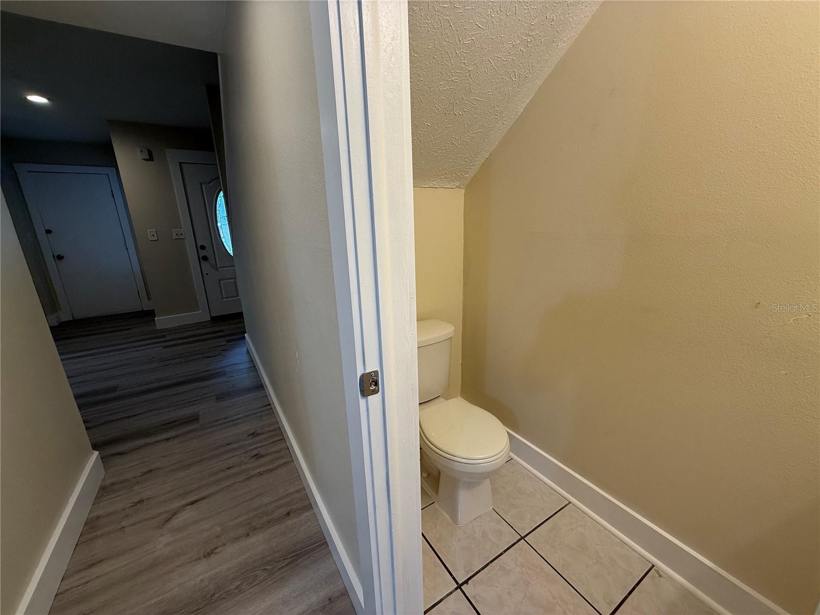 View of Hallway and half bath from Living Room