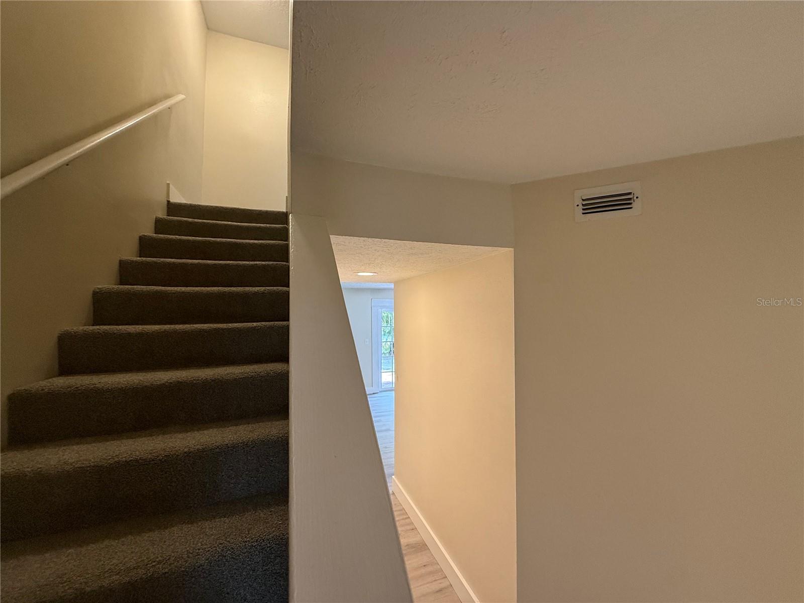 Stairwell & hallway to living room