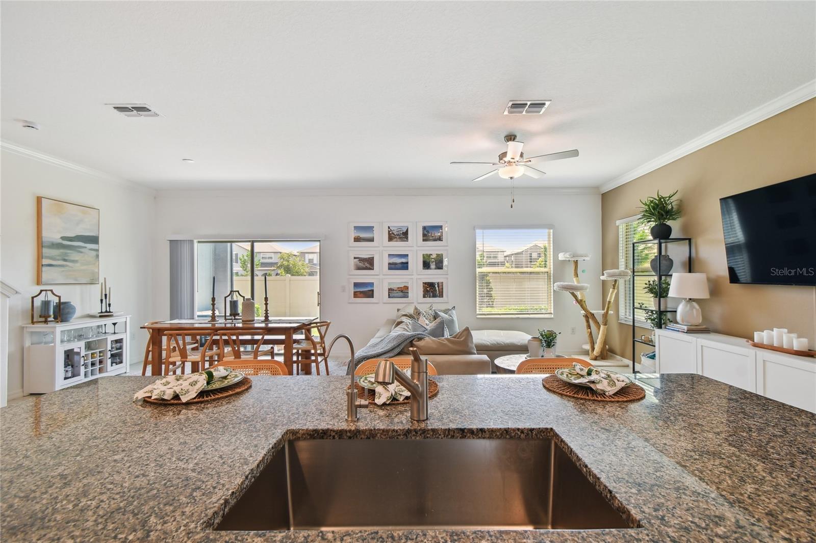 Kitchen overlooking open concept living area