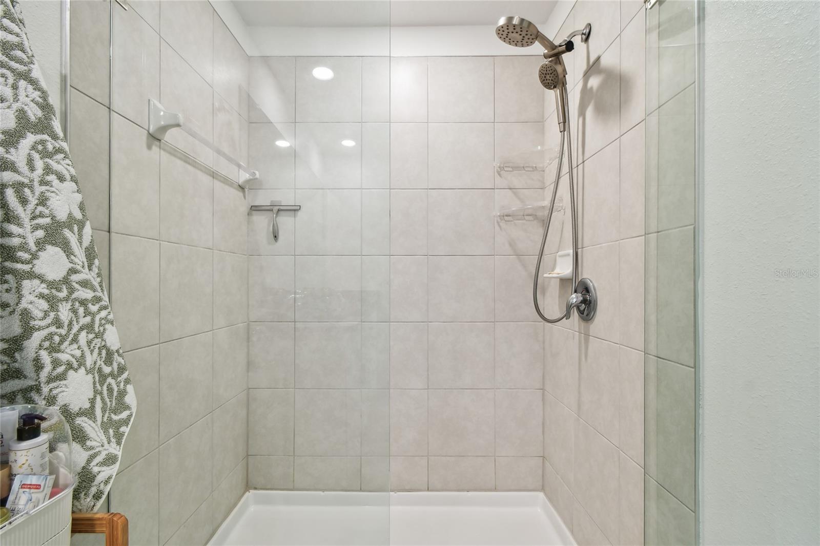 Upgraded glass soor entry to walk in shower