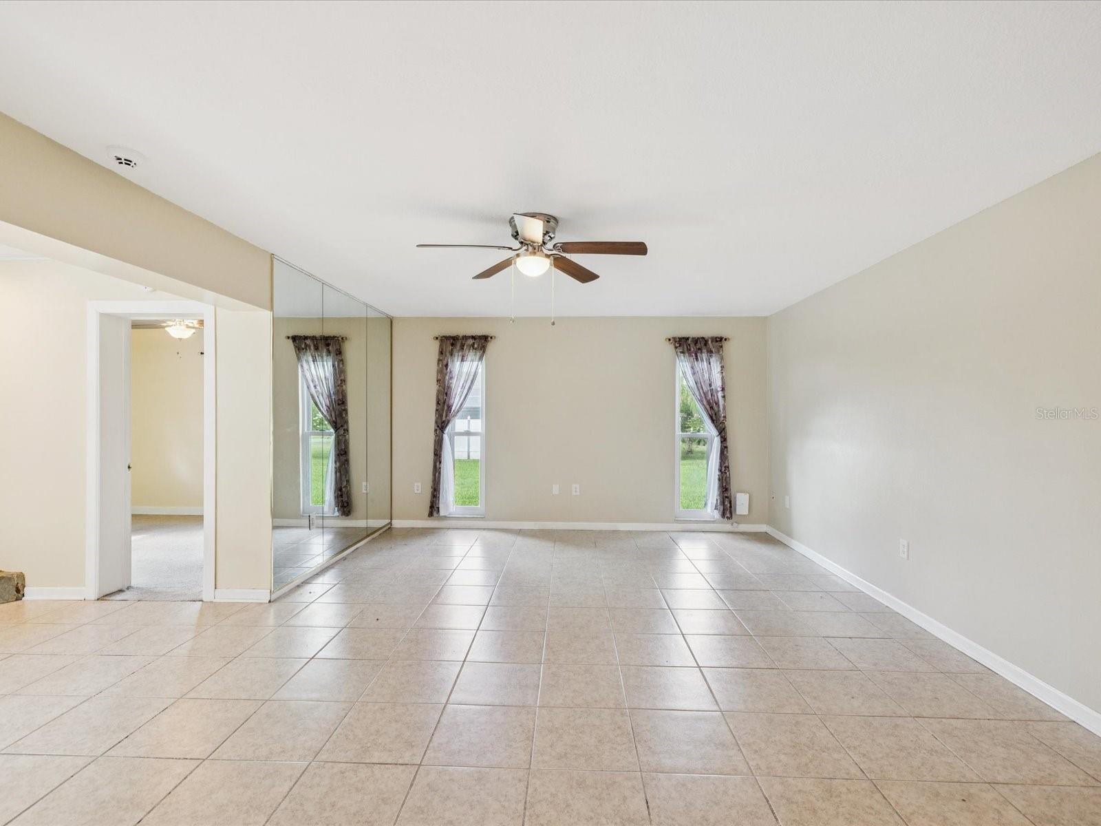 Peaceful and tranquil living room with natural light shining through new windows!