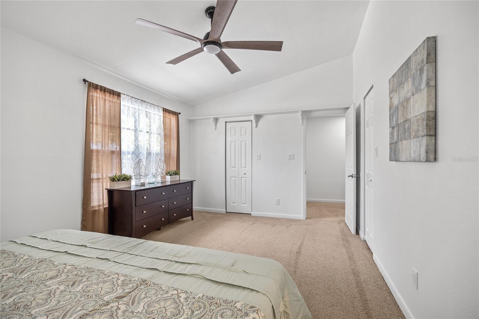 Alternate view in the Primary Bedroom.   All carpet is brand new upstairs and every bedroom has a new ceiling fan!