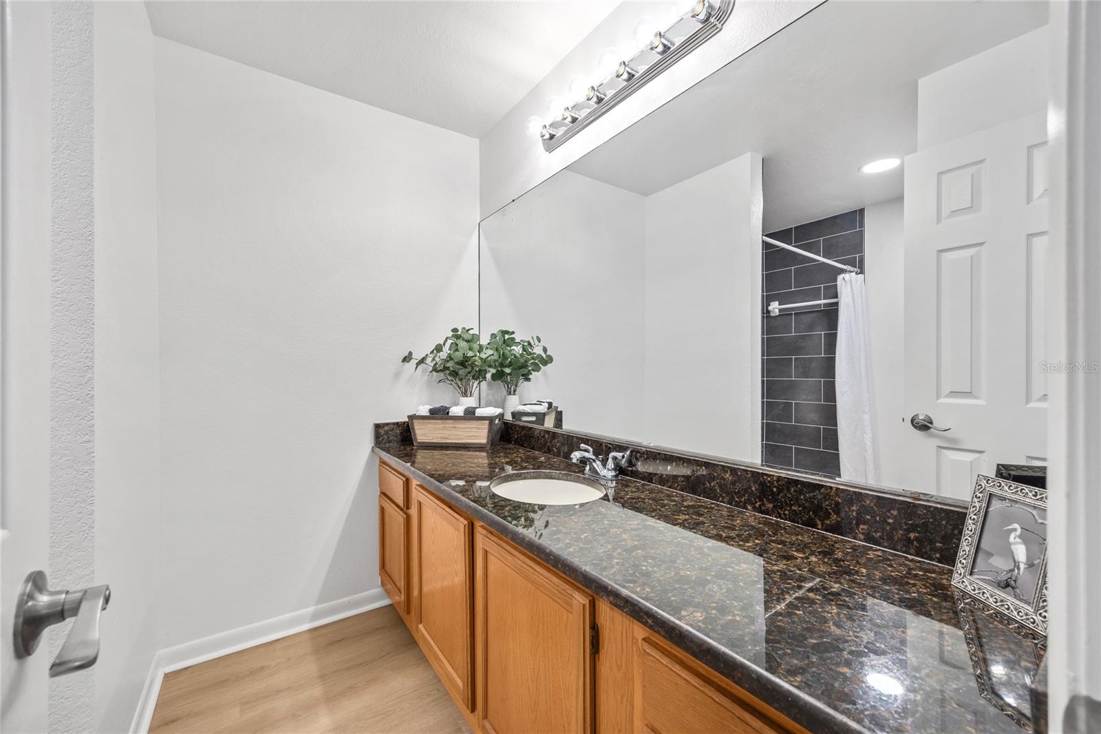The Primary Bathroom features a large vanity with plenty of room for a second sink if you desire.