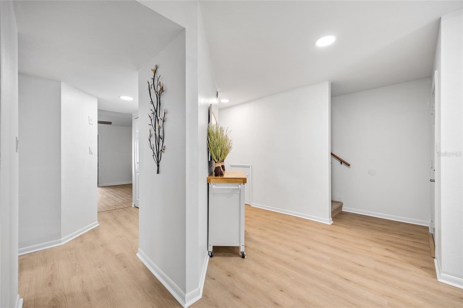 A spacious foyer welcomes you home.   Brand new Luxury Vinyl everywhere on the lower level.