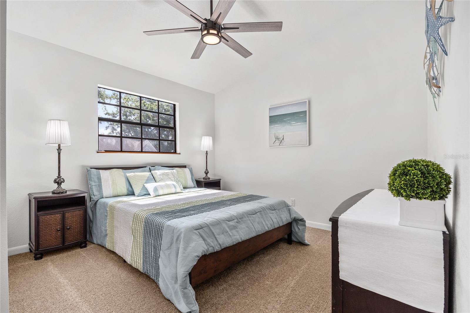 Bedroom #2.     Brand new carpet and ceiling fan!
