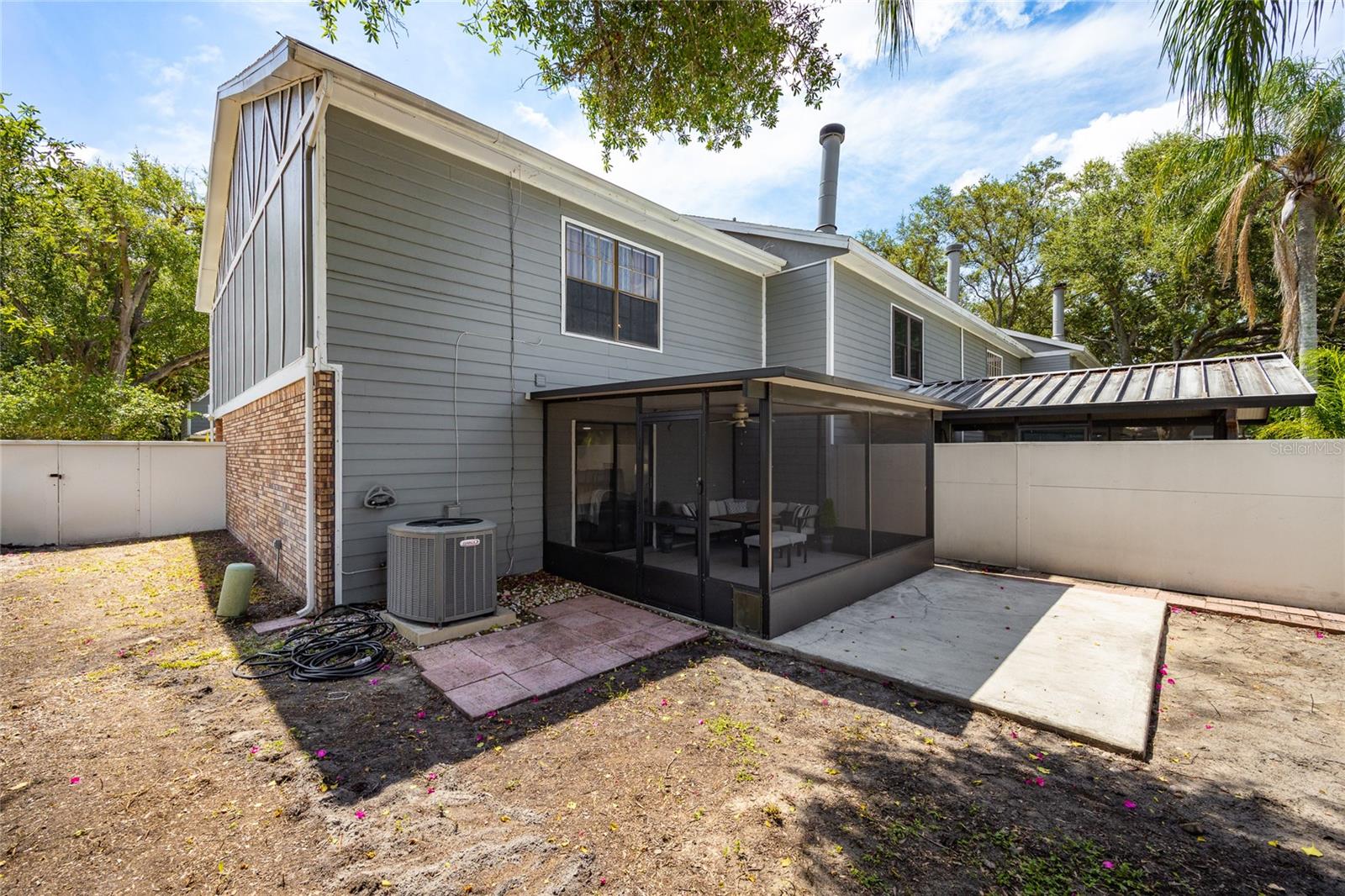 As an end unit you have a much larger side yard in addition to the space at the back of the unit.
