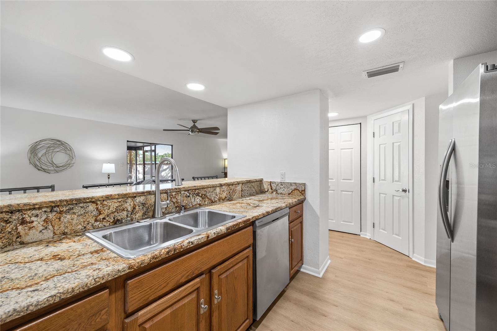 The Kitchen is open to the Great room and has a breakfast bar.