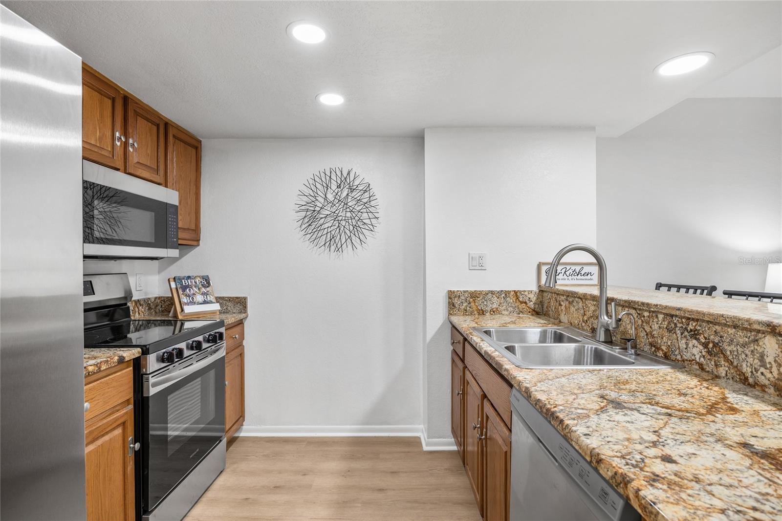 Gorgeous granite countertops provide ample space for meal prep.