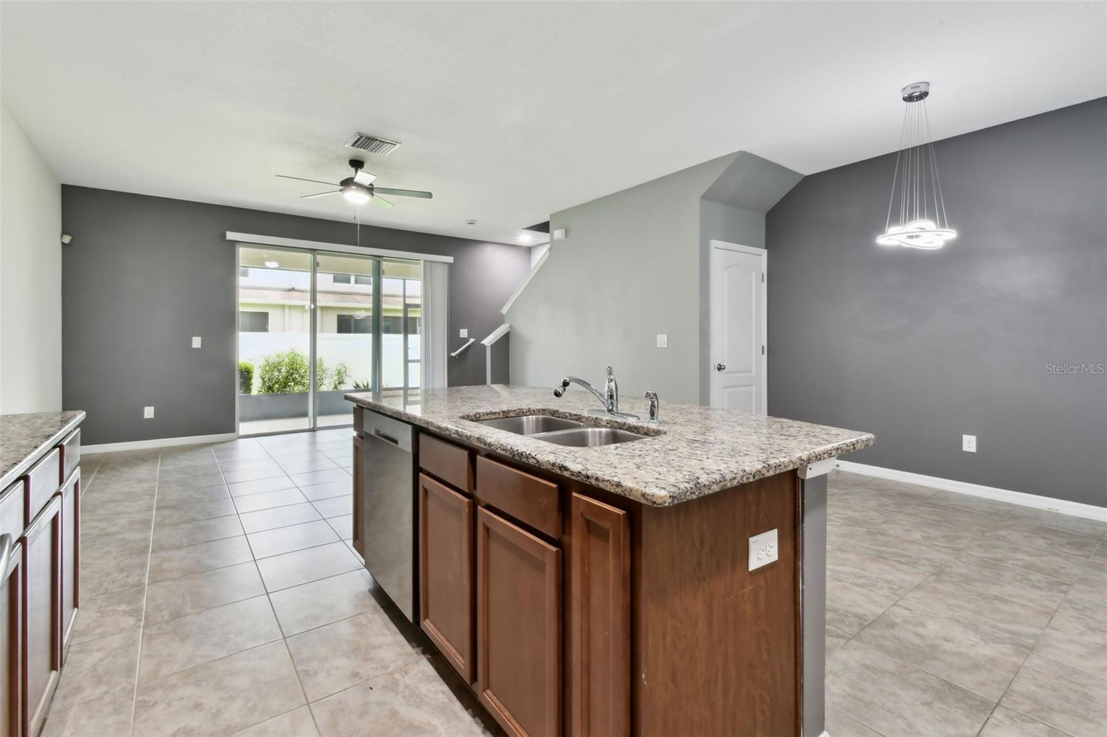 Kitchen with view toward living room