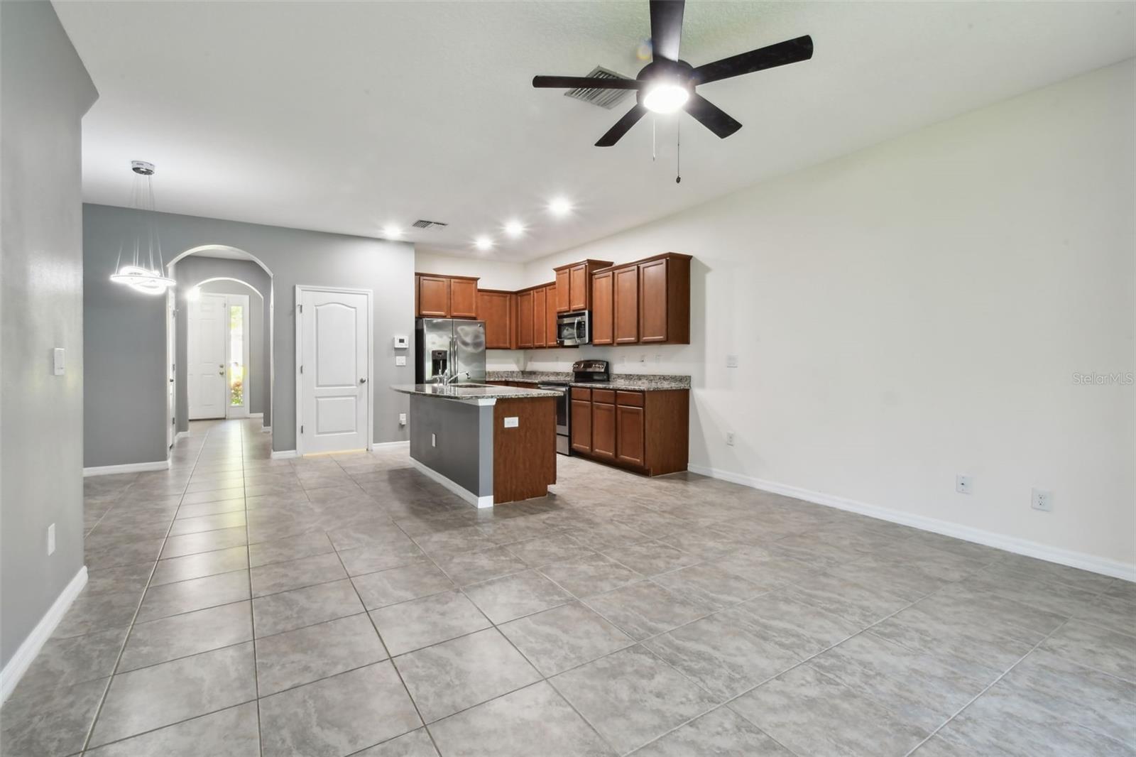 Living room with view toward kitchen
