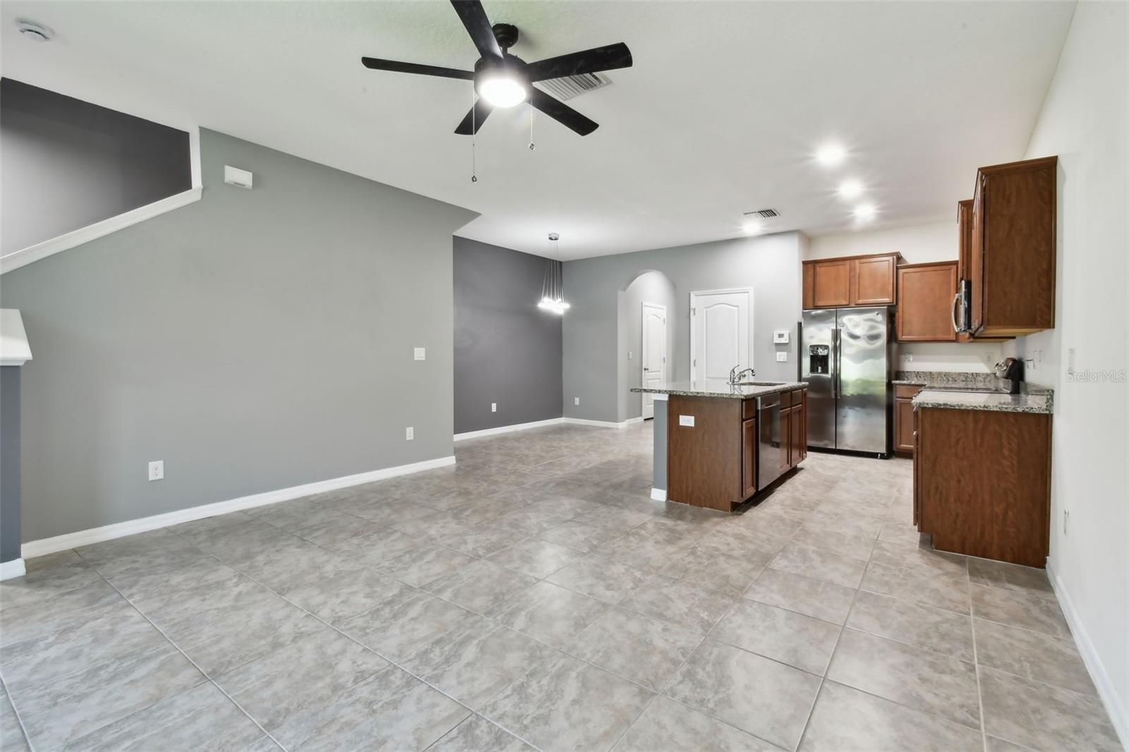 Living room with view toward kitchen