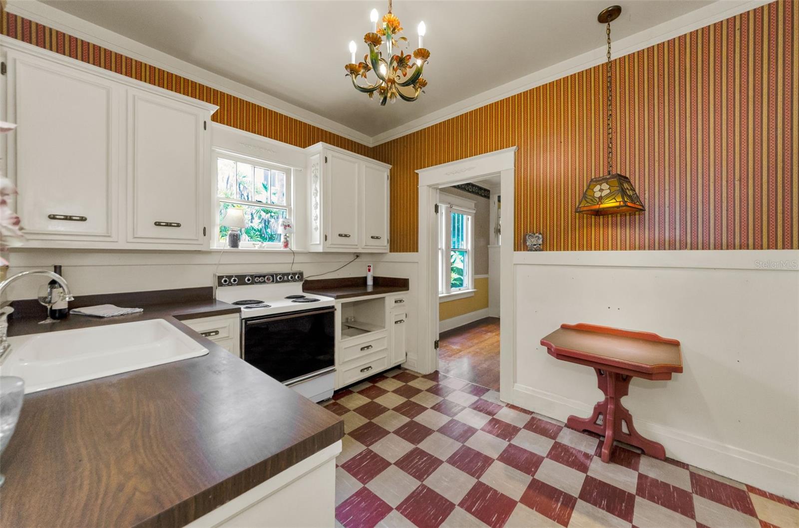 wood cabinets & Italian Chandelier