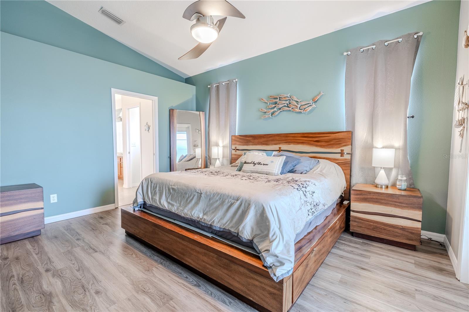 The split floor plan offers privacy, with the spacious primary suite tucked away at the back of the home.