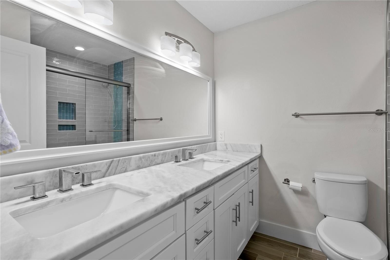 Upstairs Bathroom located between Bedrooms