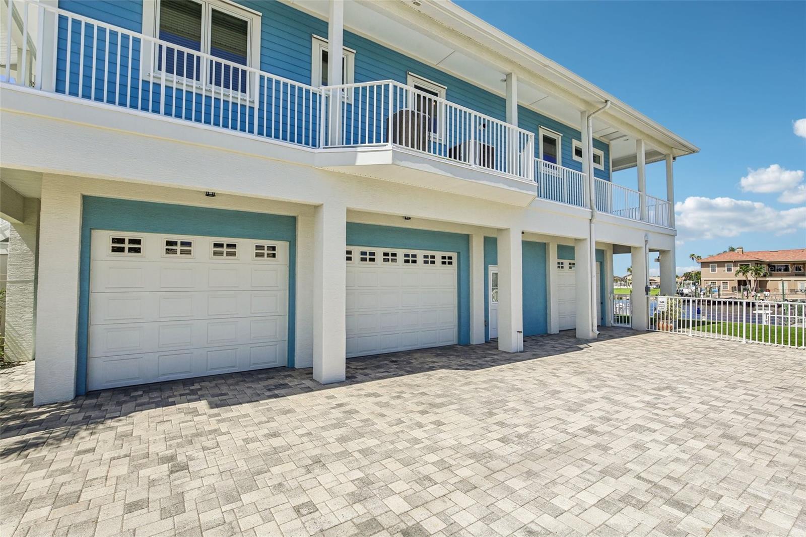 Plenty of Parking and Garage Spaces on the Paver driveway