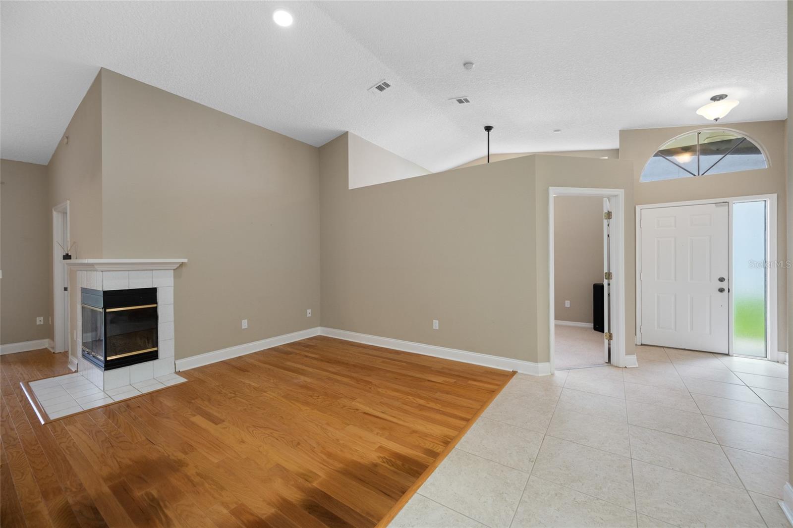 Open-Concept Living — 3005 Pepperwood Ln W Features a Spacious Living Room with Seamless Flow for Relaxation and Entertaining.