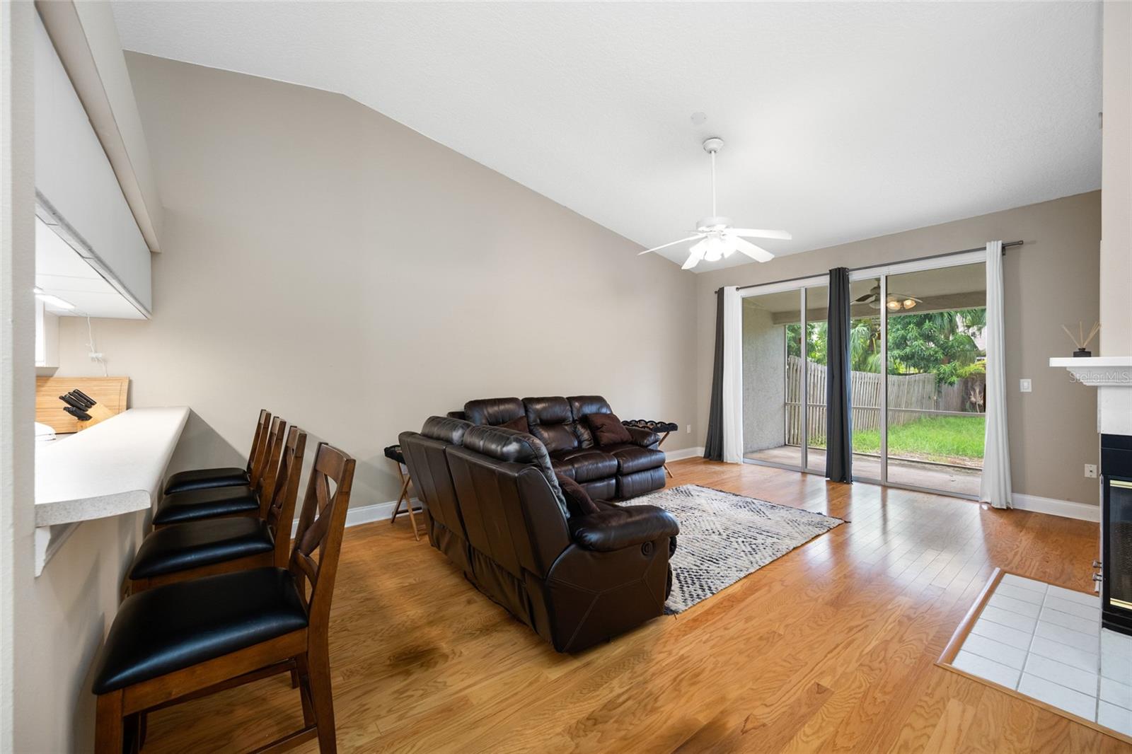 Central Gathering Space — The Open Living Room at 3005 Pepperwood Ln W Serves as the Heart of the Home, Perfect for Family Time or Entertaining.
