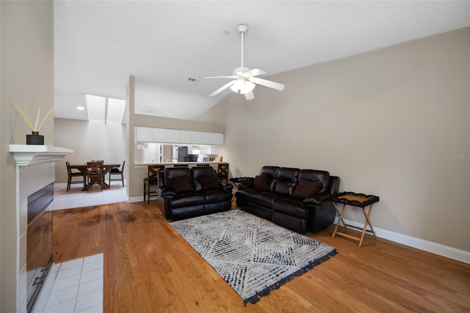 Timeless Comfort — 3005 Pepperwood Ln W Showcases a Classic, Open Living Room with Warm Finishes and Flexible Layout Options.