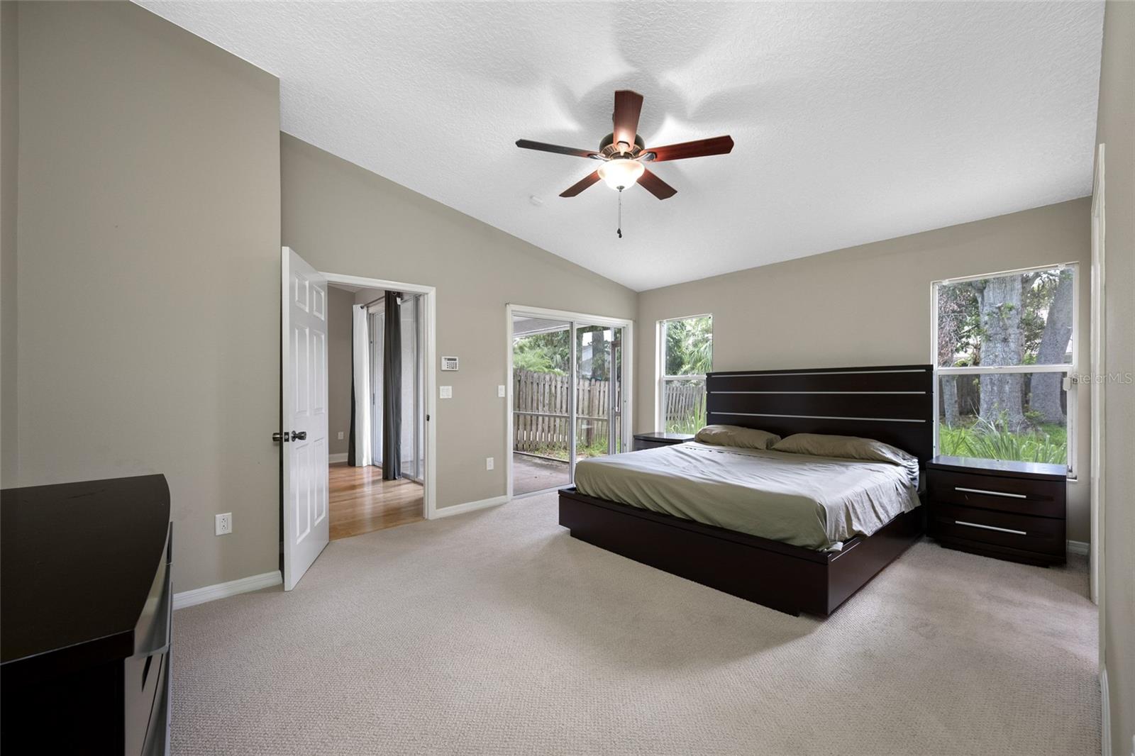 Bright & Airy Primary Bedroom — 3005 Pepperwood Ln W Showcases a Light-Filled Owner’s Suite with Room for a Sitting Area or Workstation.