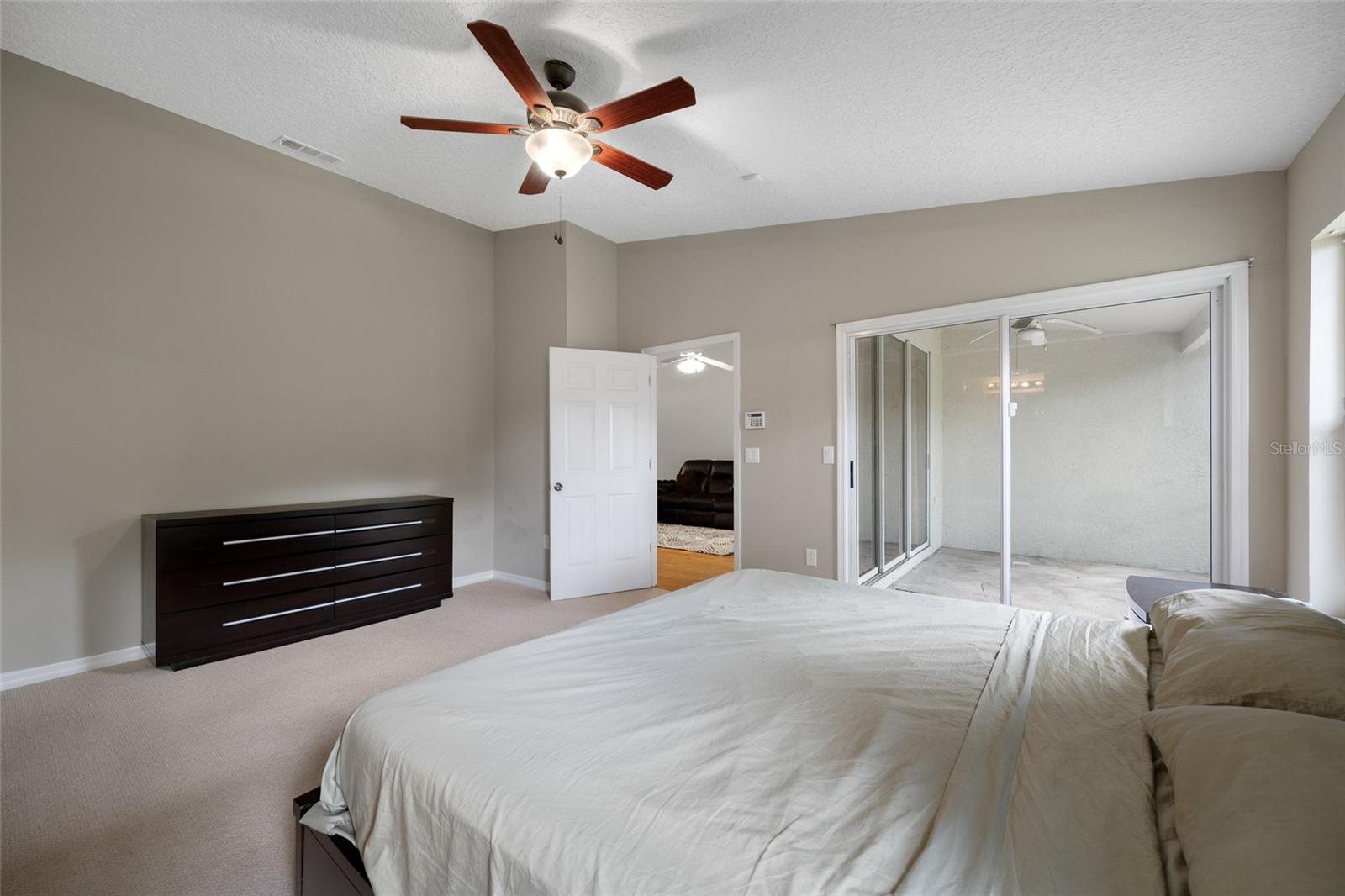 Spacious Primary Bedroom — Unwind in the Expansive Primary Suite at 3005 Pepperwood Ln W, Designed for Rest, Relaxation, and Daily Comfort.