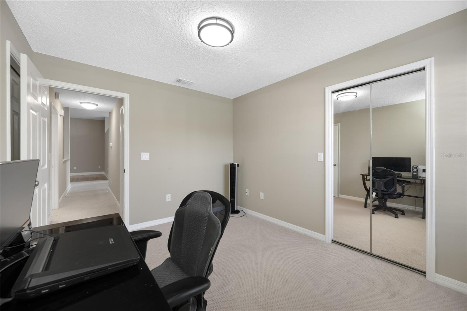 Private Third Bedroom — The Third Bedroom at 3005 Pepperwood Ln W Adds Flexibility and Functionality, Ready to Fit Your Lifestyle.