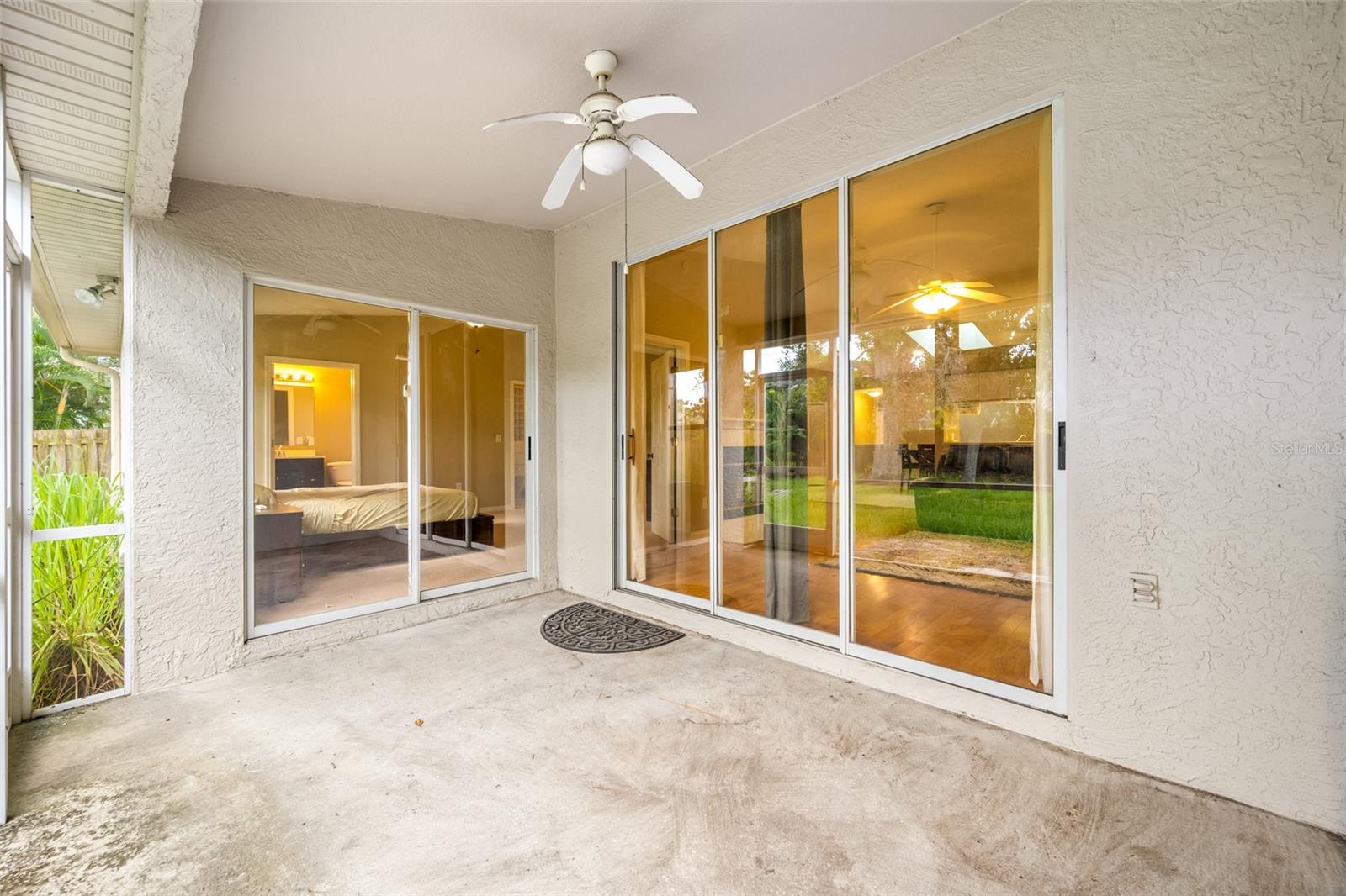 Screened-In Back Patio — Relax and Unwind in the Private, Bug-Free Outdoor Living Space at 3005 Pepperwood Ln W, Perfect for Morning Coffee or Evening Gatherings