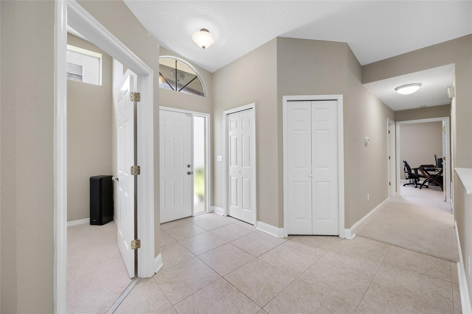 Bright, Welcoming Foyer — Step Inside 3005 Pepperwood Ln W and Experience an Open, Inviting Entry That Sets the Tone for Comfortable Clearwater Living.