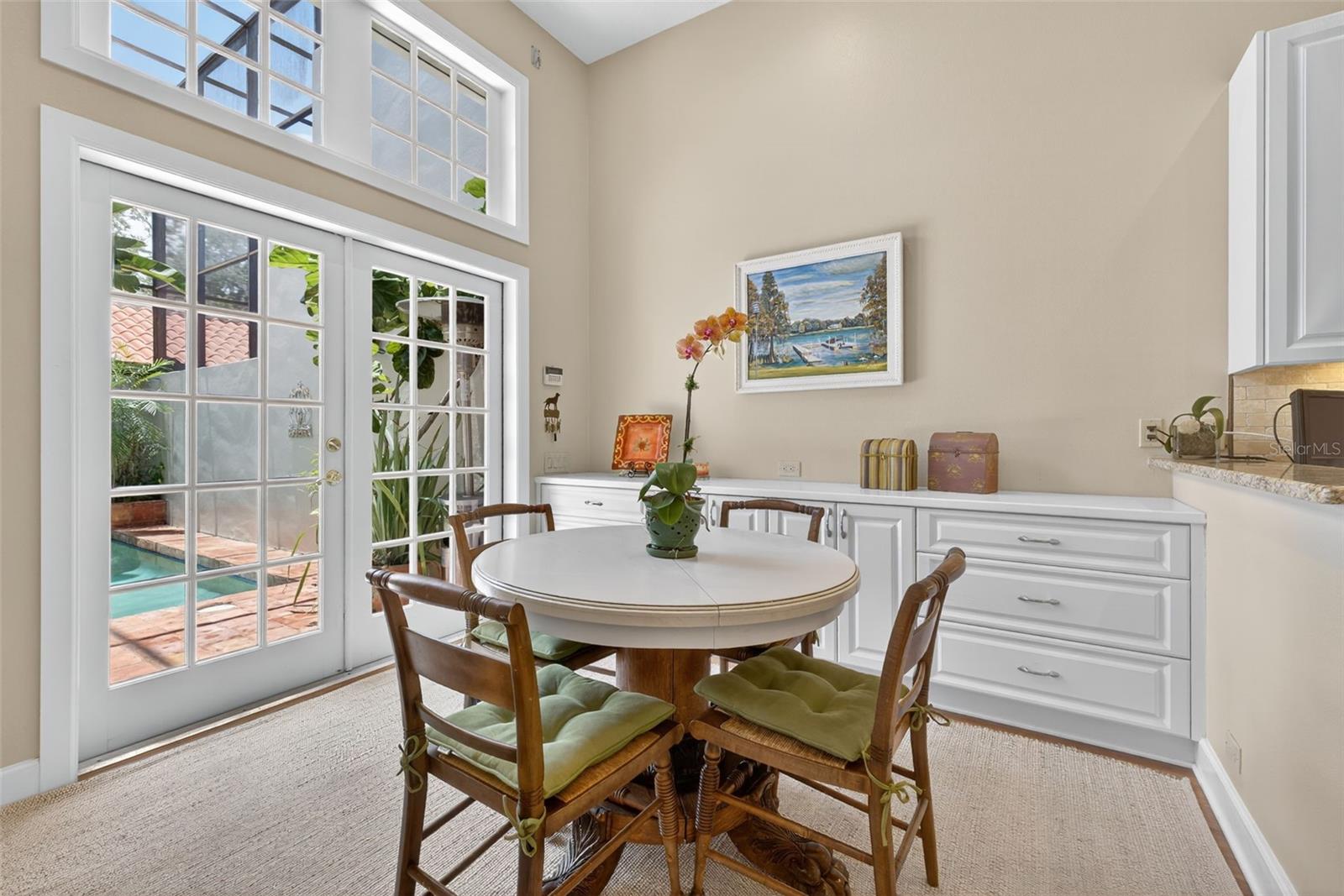 Eating area off kitchen also serves as rear door to lanai