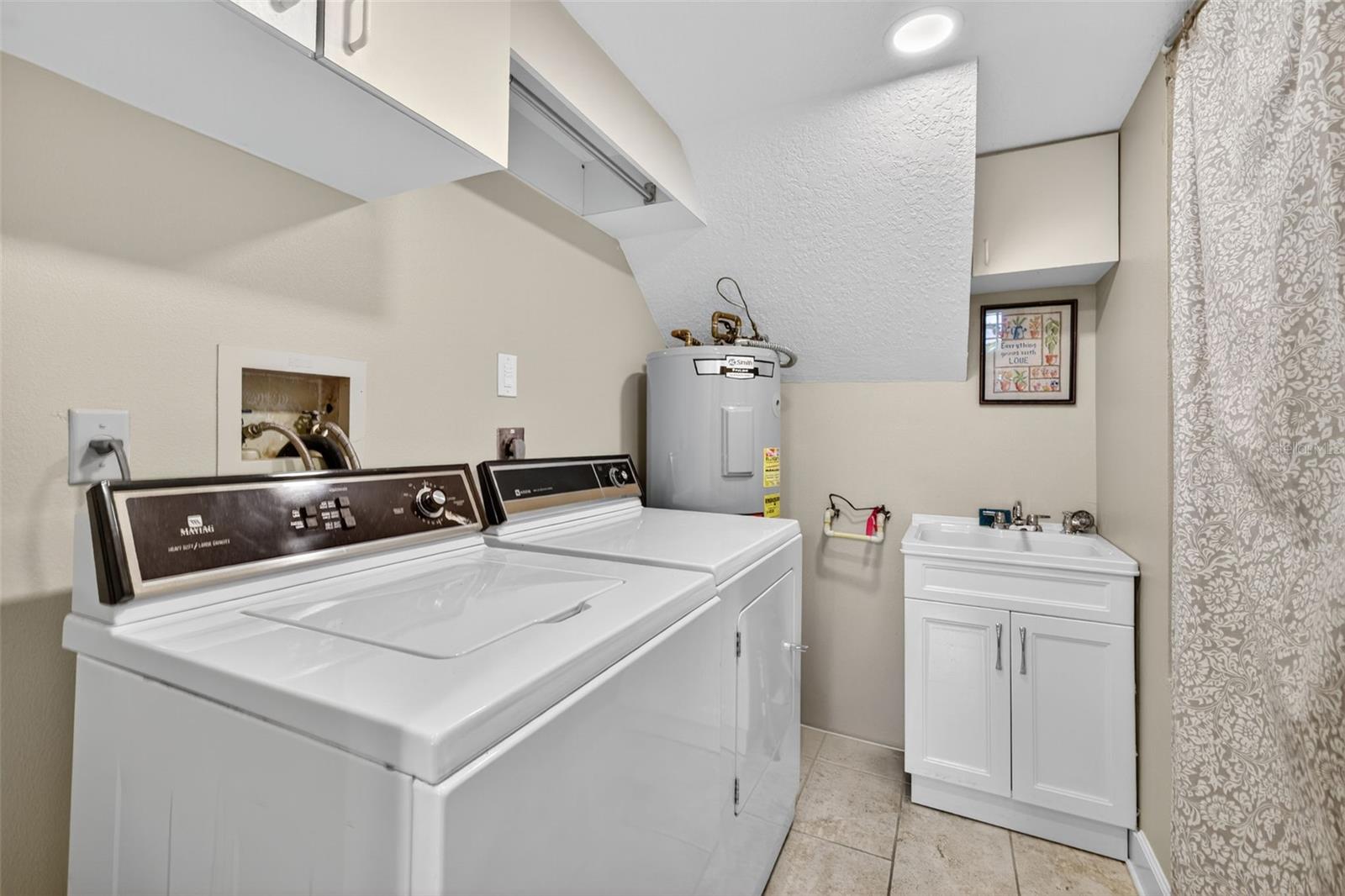 Laundry, storage and utility sink room