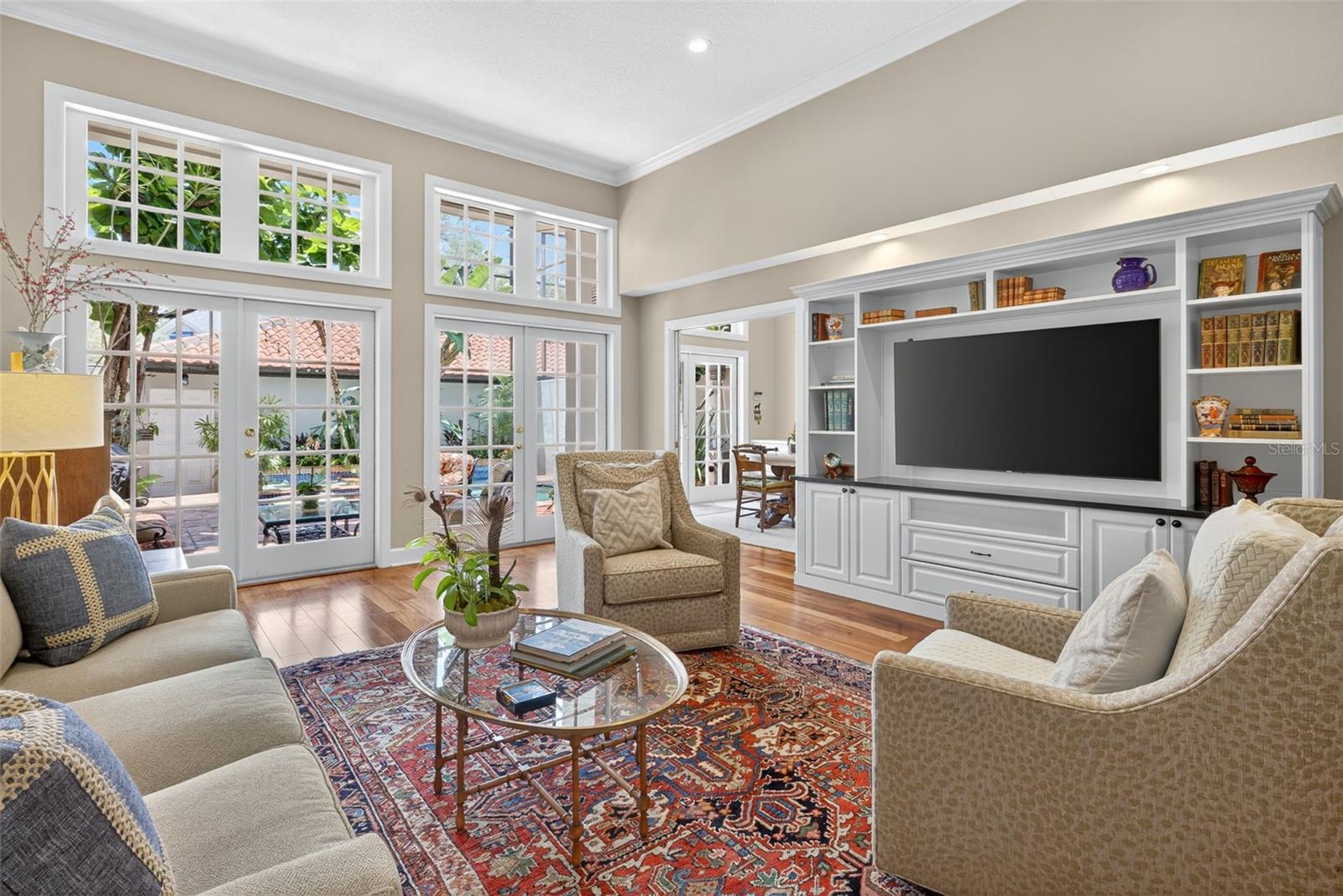 Living Room looking out French doors to pool area